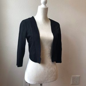 White House Black Market shrug